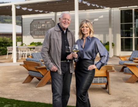 Rich and Leslie Frank posed in front of the Miller House.