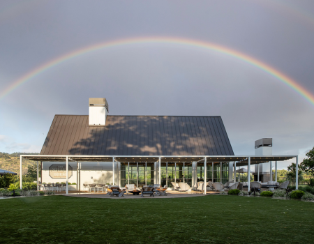 Miller House with a rainbow stretched over it. 