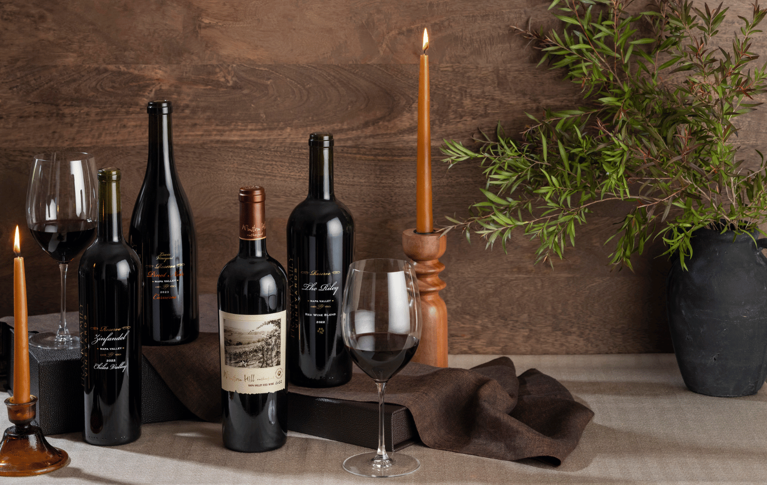 Three bottles of Reserve wine set against a fall back drop. 