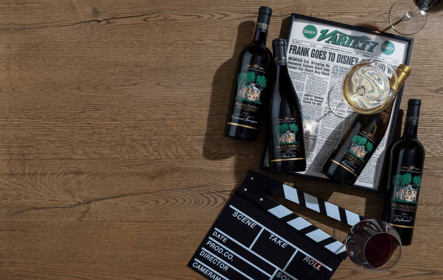 A collection of Chardonnay, Pinot Noir, Zinfandel, and Cabernet set against Rich Frank's Hollywood memorabilia.